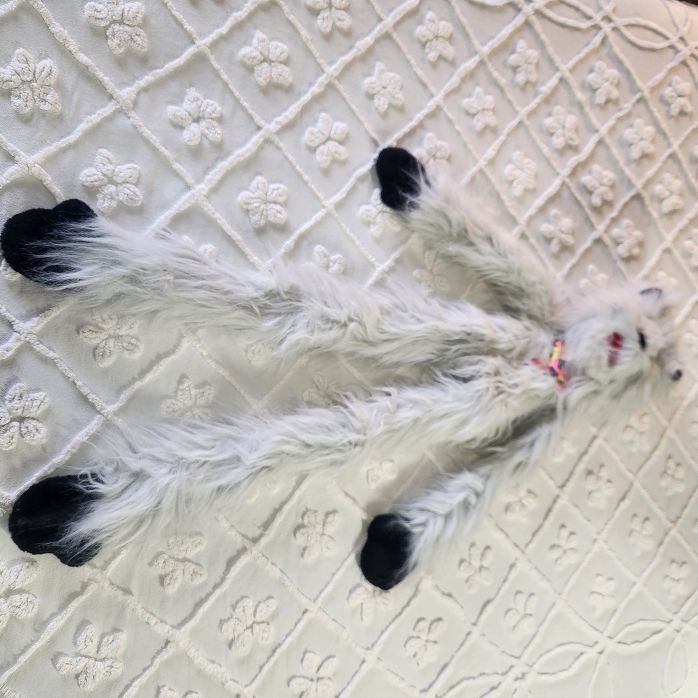 Plush White and Black Toy